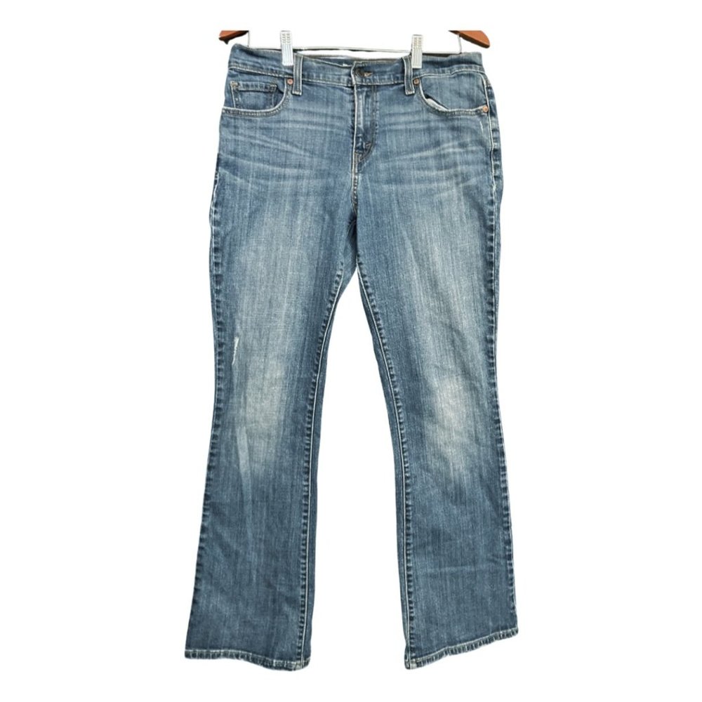 Levis 515 size 14 M Boot Cut Distressed Denim Jean
